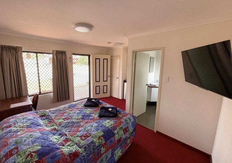 Internal shot of a motel accommodation room at Commercial Hotel Meekatharra.